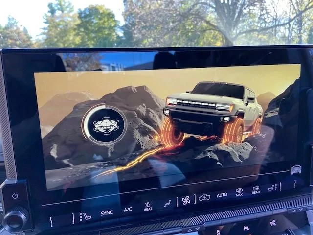 Rivian R1T R1S R1T vs GMC Hummer EV side-by-side look humscreen