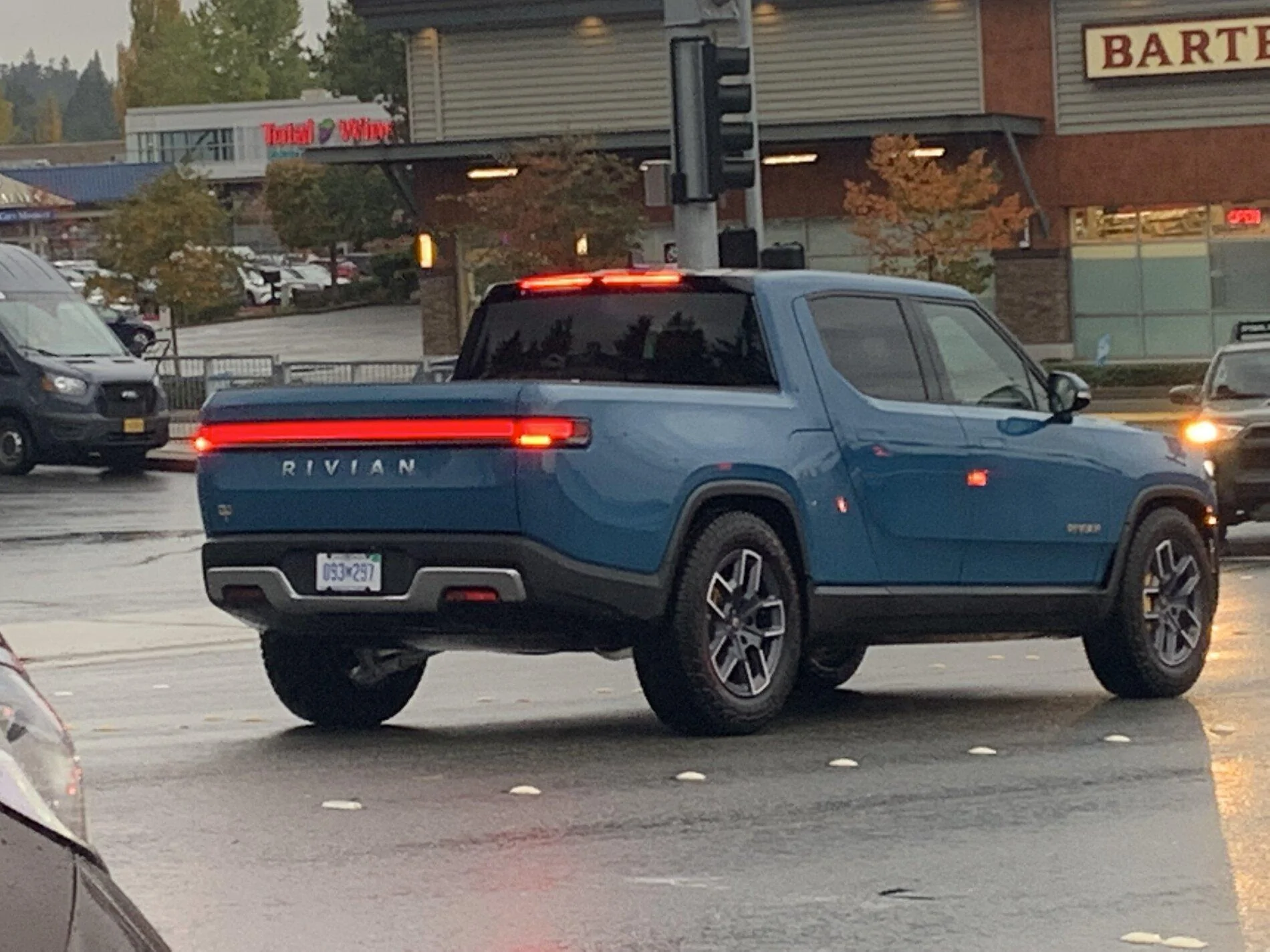 Rivian R1T R1S ? Multiple R1T spotted inside Bellevue Rivian Service Center IMG_0005