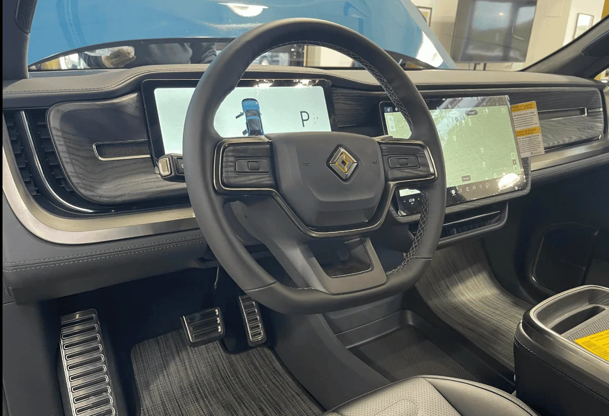 Rivian R1T R1S Why is there a dead peddle on the drivers side but not the passengers?  Can it be removed? 1635703297144