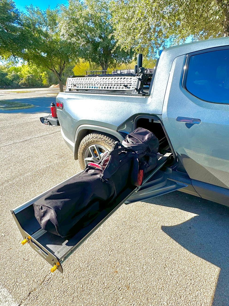 Rivian R1T R1S Does your golf bag fits into gear tunnel? IMG_4346