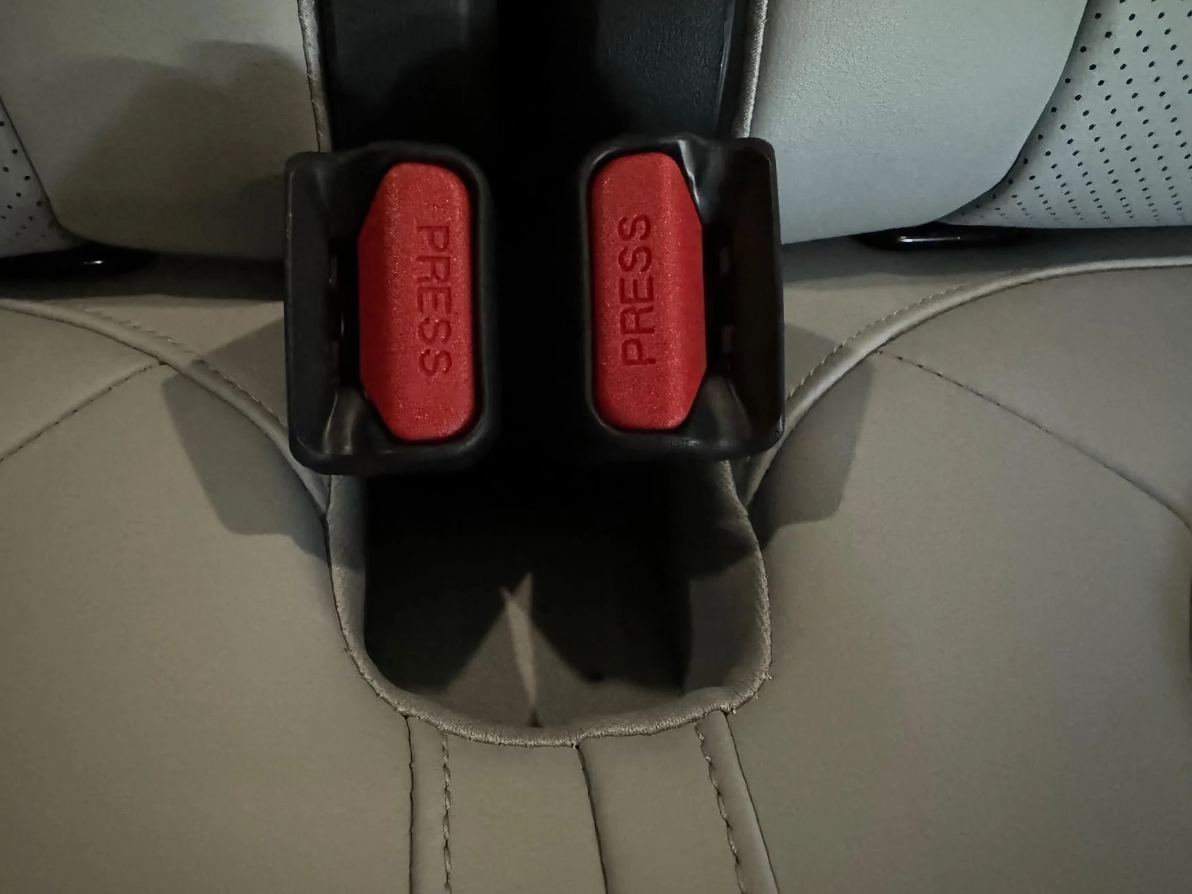 Rivian R1T R1S Items lost in 3rd row seat belt area IMG_0811