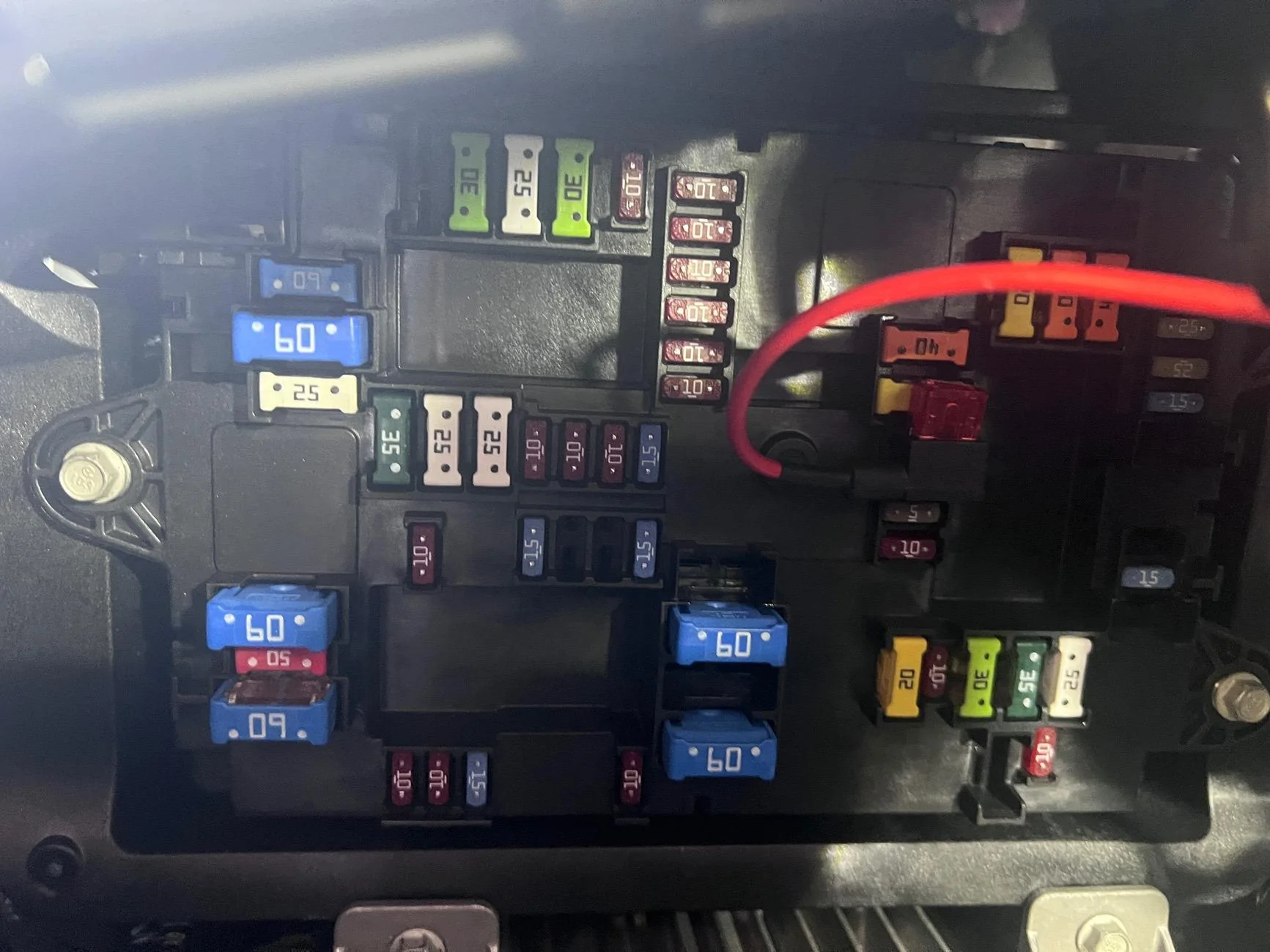 Rivian R1T R1S Interior passenger-side fuse box IMG_0363