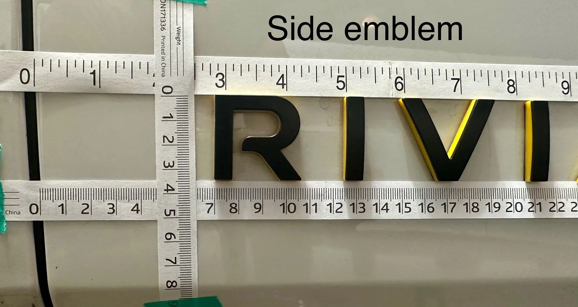 Rivian R1T R1S Abstract Ocean Rivian Emblem - Spacing? IMG_6952
