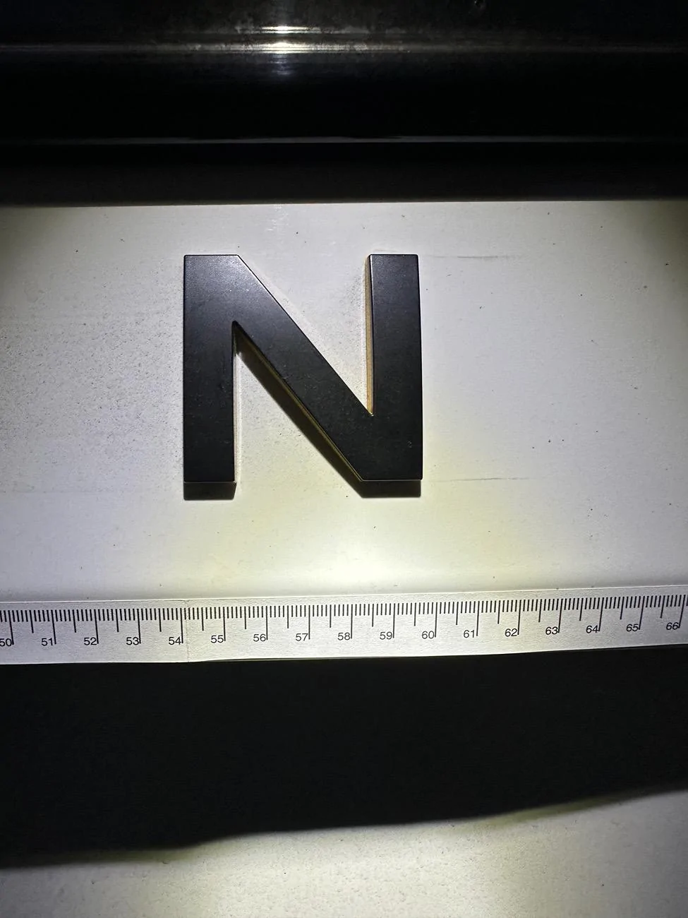Rivian R1T R1S Abstract Ocean Rivian Emblem - Spacing? IMG_6959