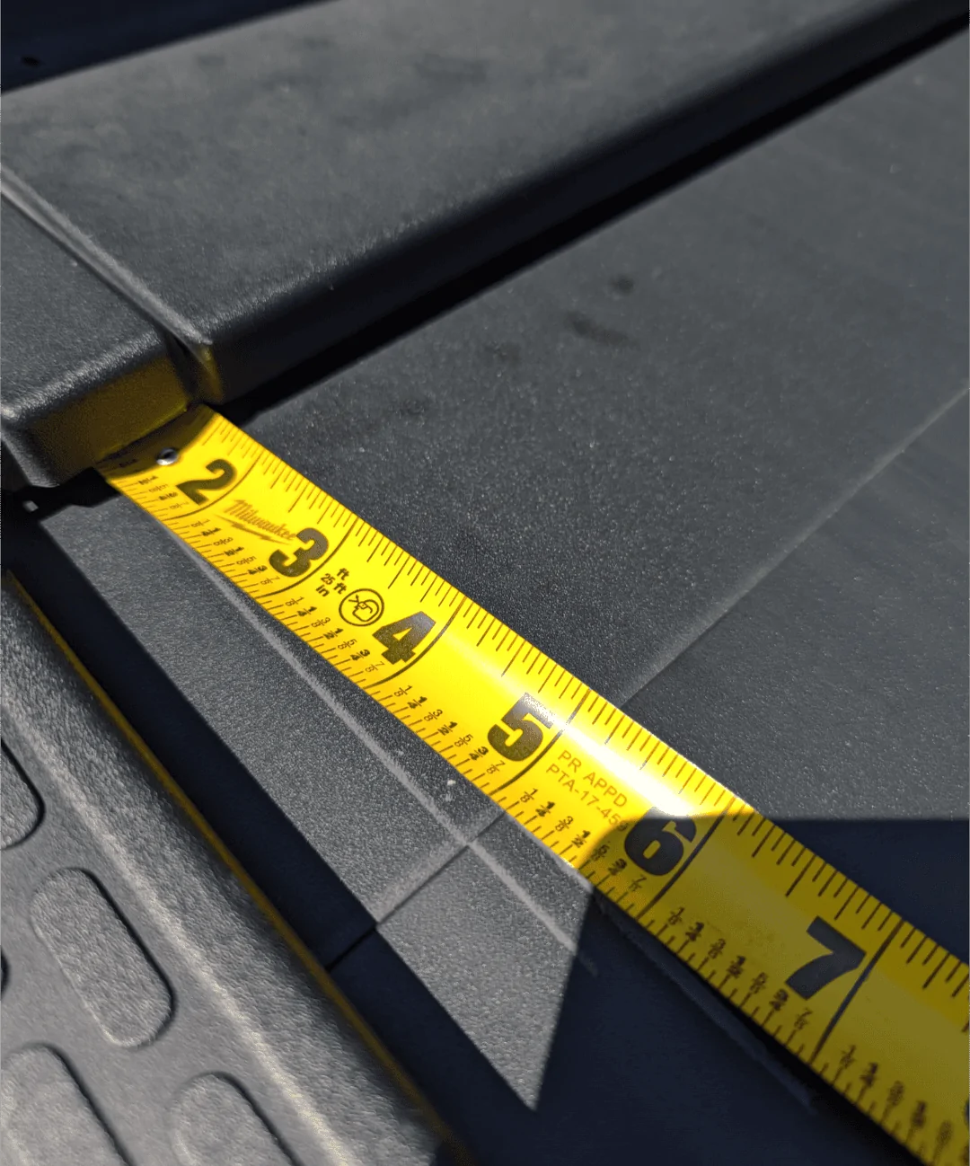 Rivian R1T R1S Whoops, that escalated quickly. Tonneau cover ate tape measure. Screenshot_20240807-141635