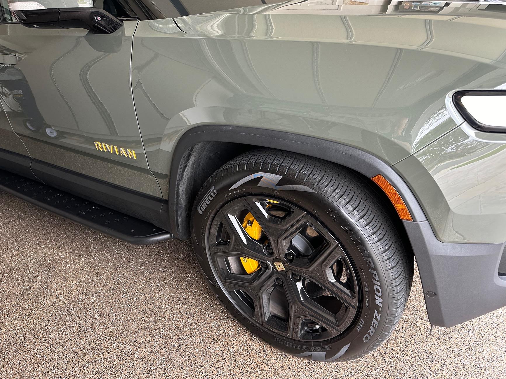 Rivian R1T R1S Cleaning black plastic on rocker panel IMG_9934