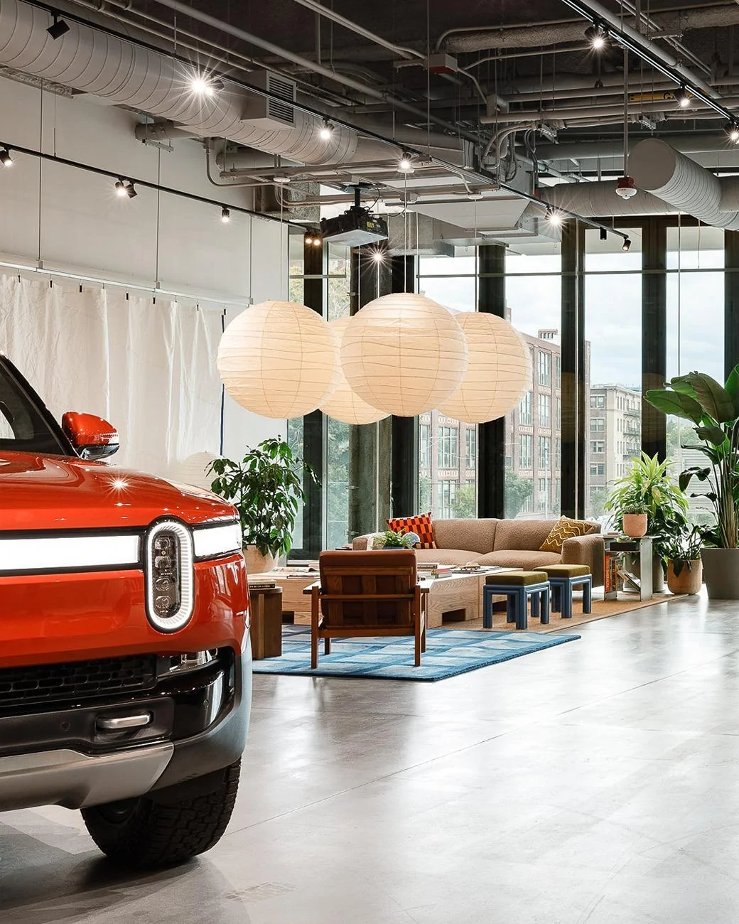 Rivian R1T R1S New Rivian Space opens in Back Bay, Boston GWGnZHCasAMCzAR