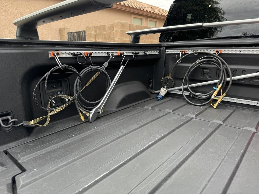 Rivian R1T R1S Forward bed panel removal 1725386299625-q2
