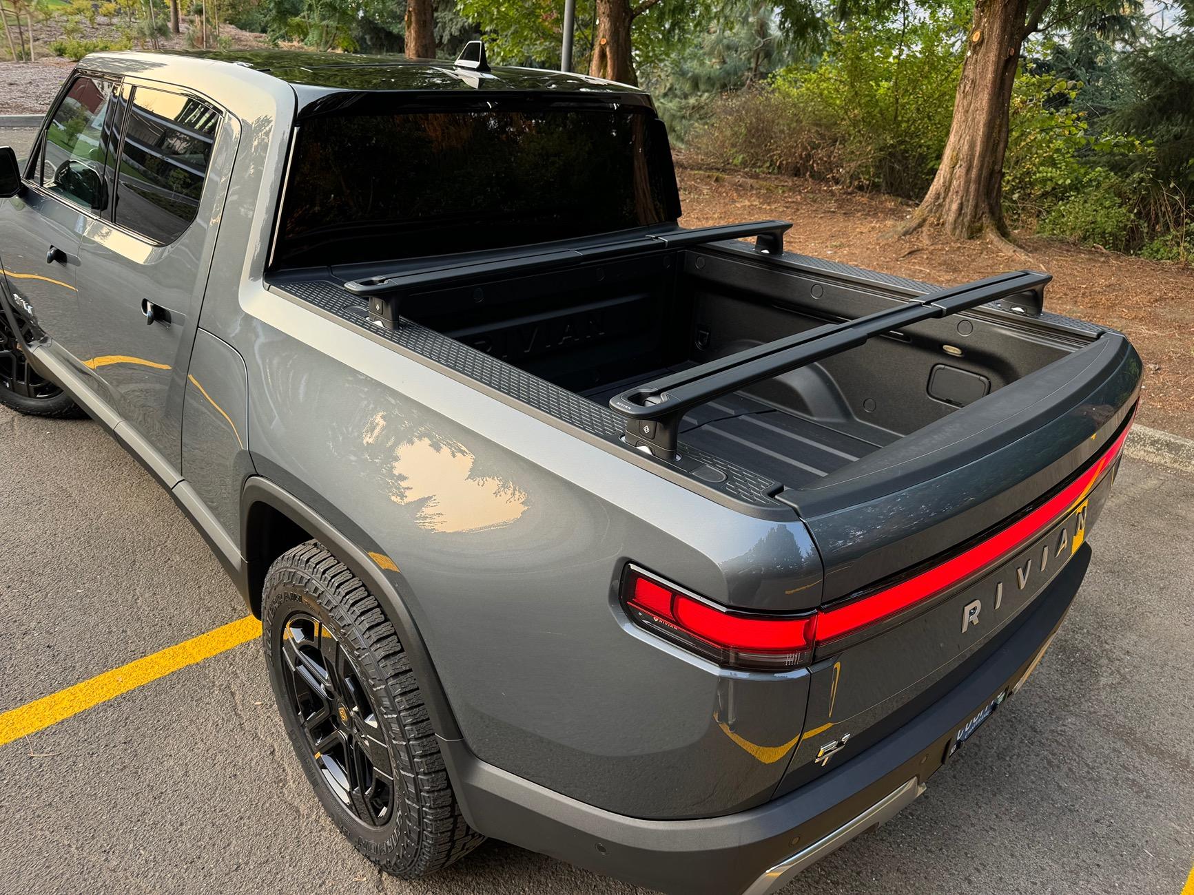 Rivian R1T R1S Rivian Black Crossbars installed on R1T (El Cap) -- Photos on roof and bed IMG_2138