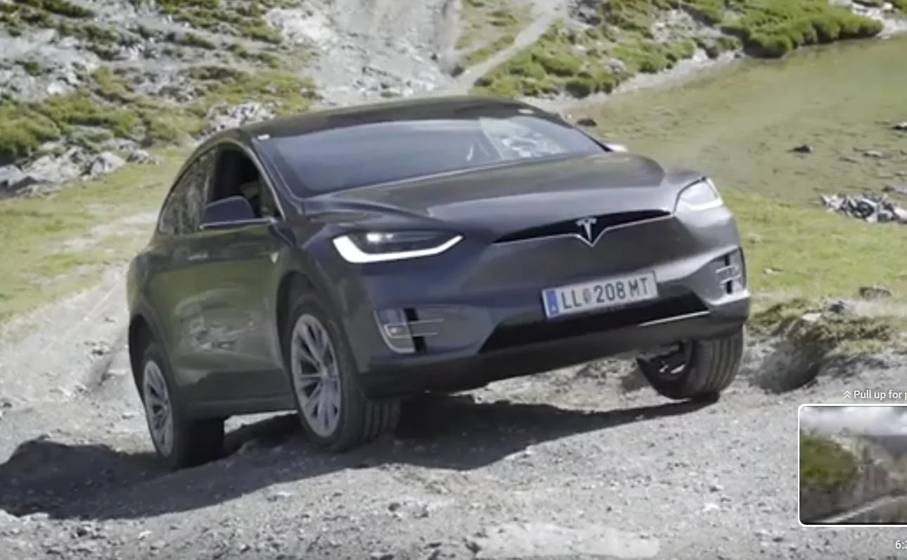 Rivian R1T R1S Longest-Range Rivian R1S Versus Tesla Model X AWD -- North American Specifications Comparison Model X on Dirst Road