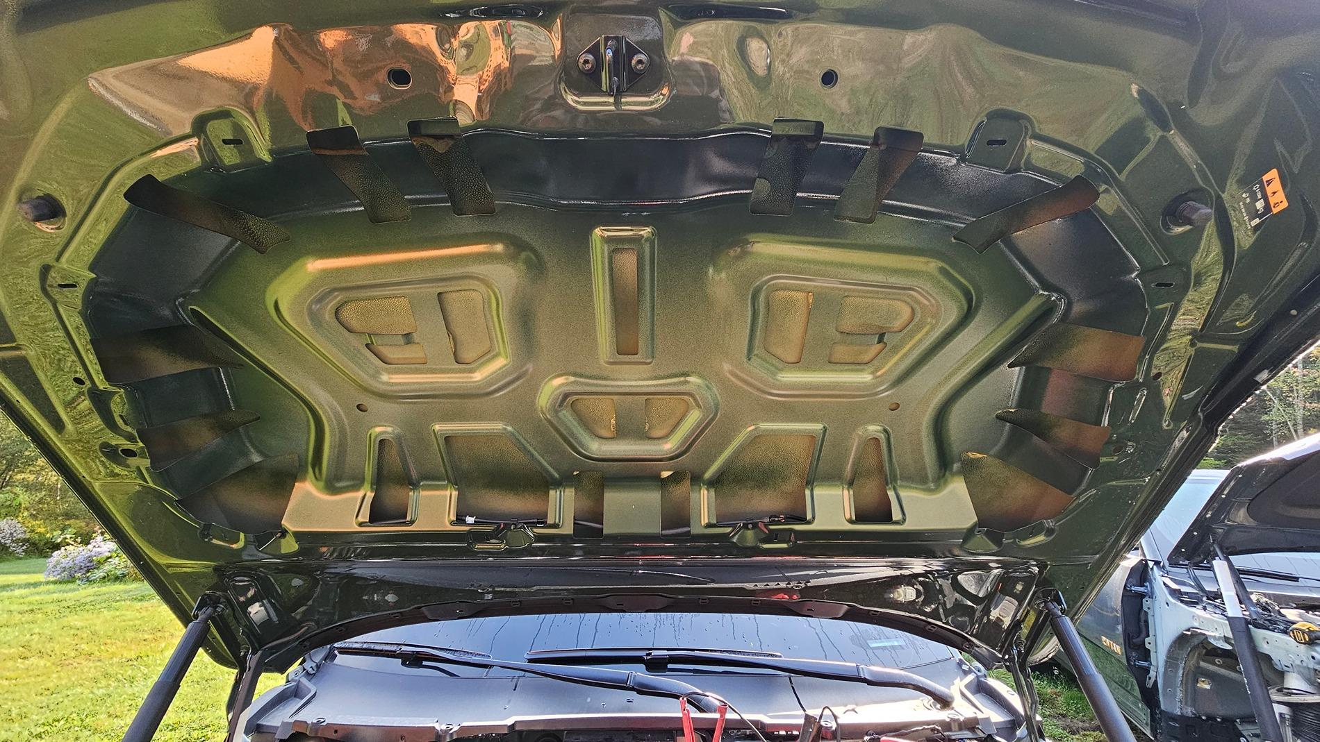 Rivian R1T R1S Attachments for underside of hood? 20240918_095126
