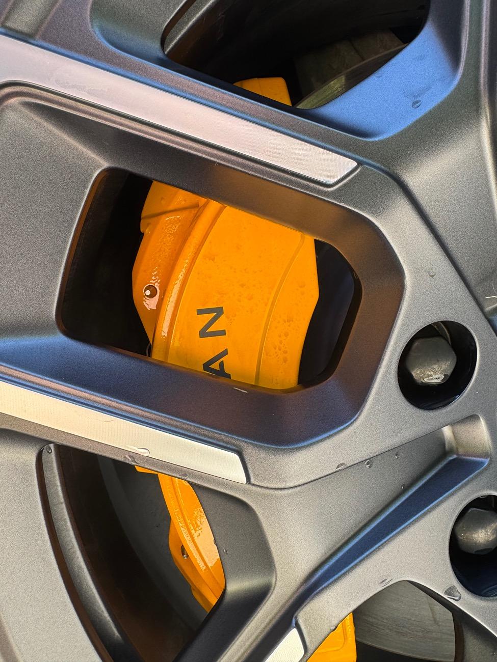 Rivian R1T R1S Dark staining on yellow calippers IMG_2392