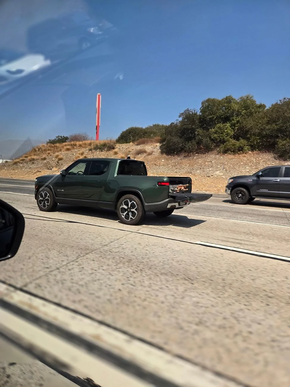 Rivian R1T R1S Another Rivian just doing truck things!! ? 20240927_123152