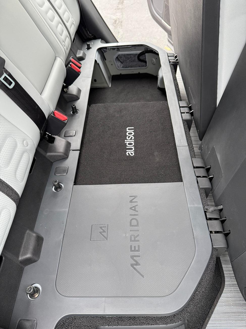 Rivian R1T R1S Audison Prima Box w/ Amp 22 R1T Installed under rear seats IMG_0045