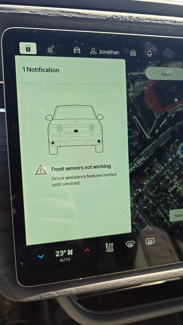 Rivian R1T R1S I'm still at Rivian service center, picked up my R1S and this happened as I drove off 20241001_111658