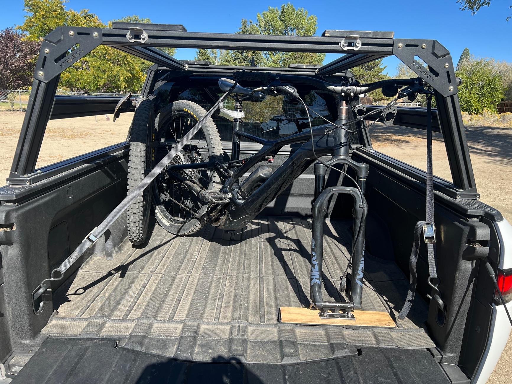 Rivian R1T R1S Bed mounted vs hitch mounted bike rack? IMG_0446