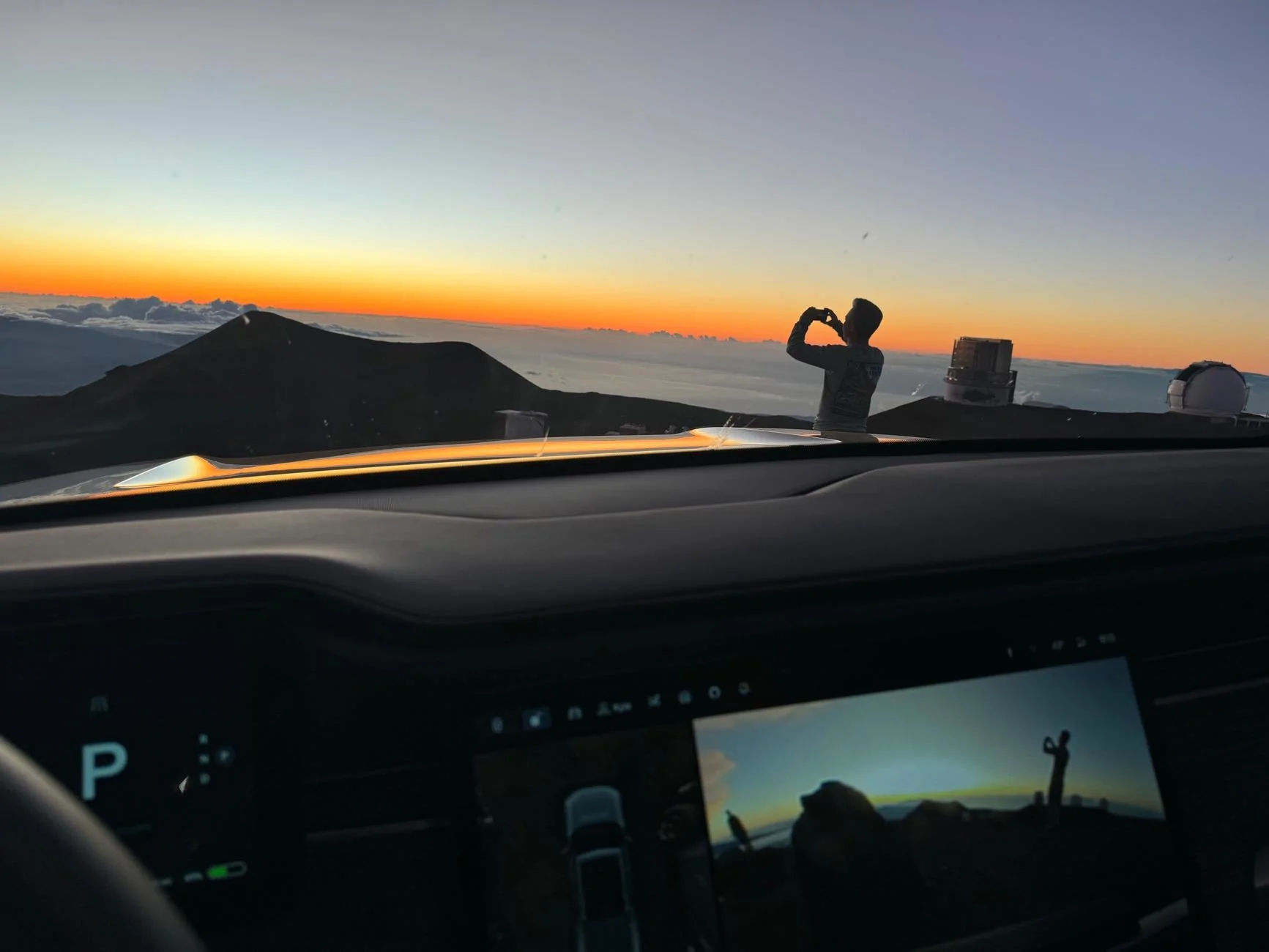 Rivian R1T R1S Chilly sunset from 13,751 feet at the summit of Mauna Kea, Big Island of Hawaii. tempImage1sizD1