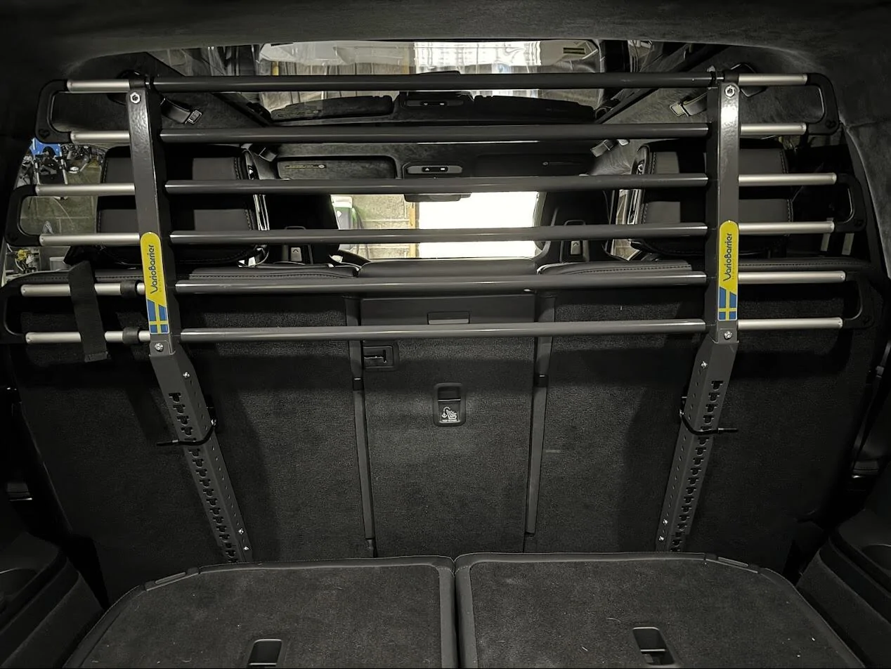 Rivian R1T R1S Anyone using the third-row (R1S) for dog transport expensive-r1s-dog-barrier-v0-gfn6ef4xskwd1