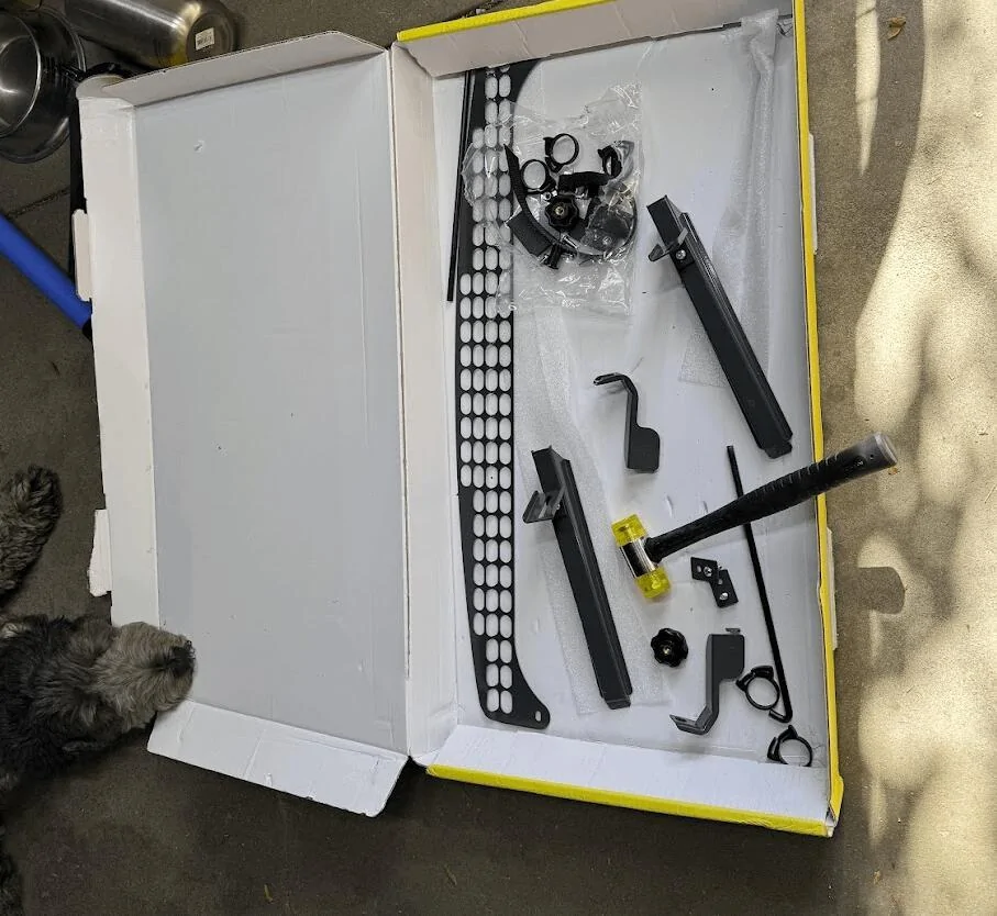 Rivian R1T R1S Anyone using the third-row (R1S) for dog transport expensive-r1s-dog-barrier-v0-iazsiu39vkwd1
