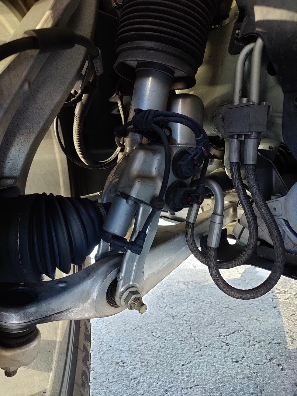 Rivian R1T R1S RS1 making clicking sound while driving. IMG20241027164823