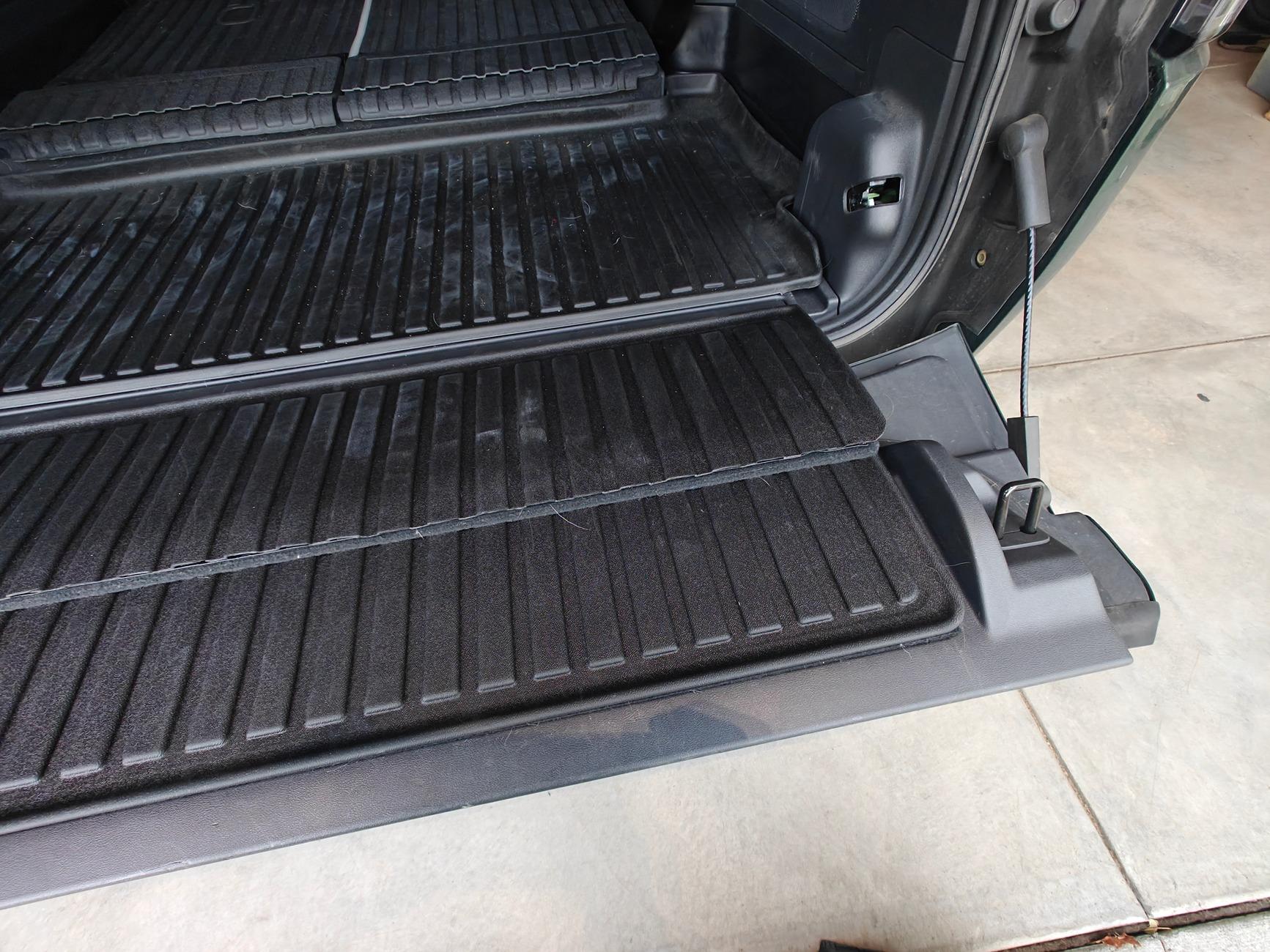 Rivian R1T R1S Simple mod to protect lower side carpet in rear cargo area R1S IMG20241104162356