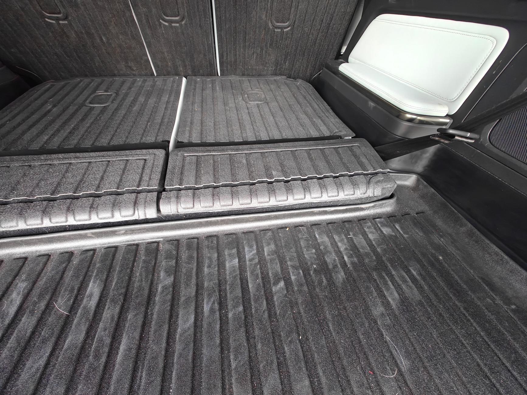 Rivian R1T R1S Simple mod to protect lower side carpet in rear cargo area R1S IMG20241104162400