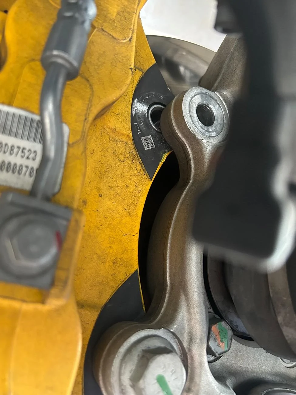 Rivian R1T R1S MUSSING BOLT-Bolt Spec needed-Front brake caliper IMG_6209
