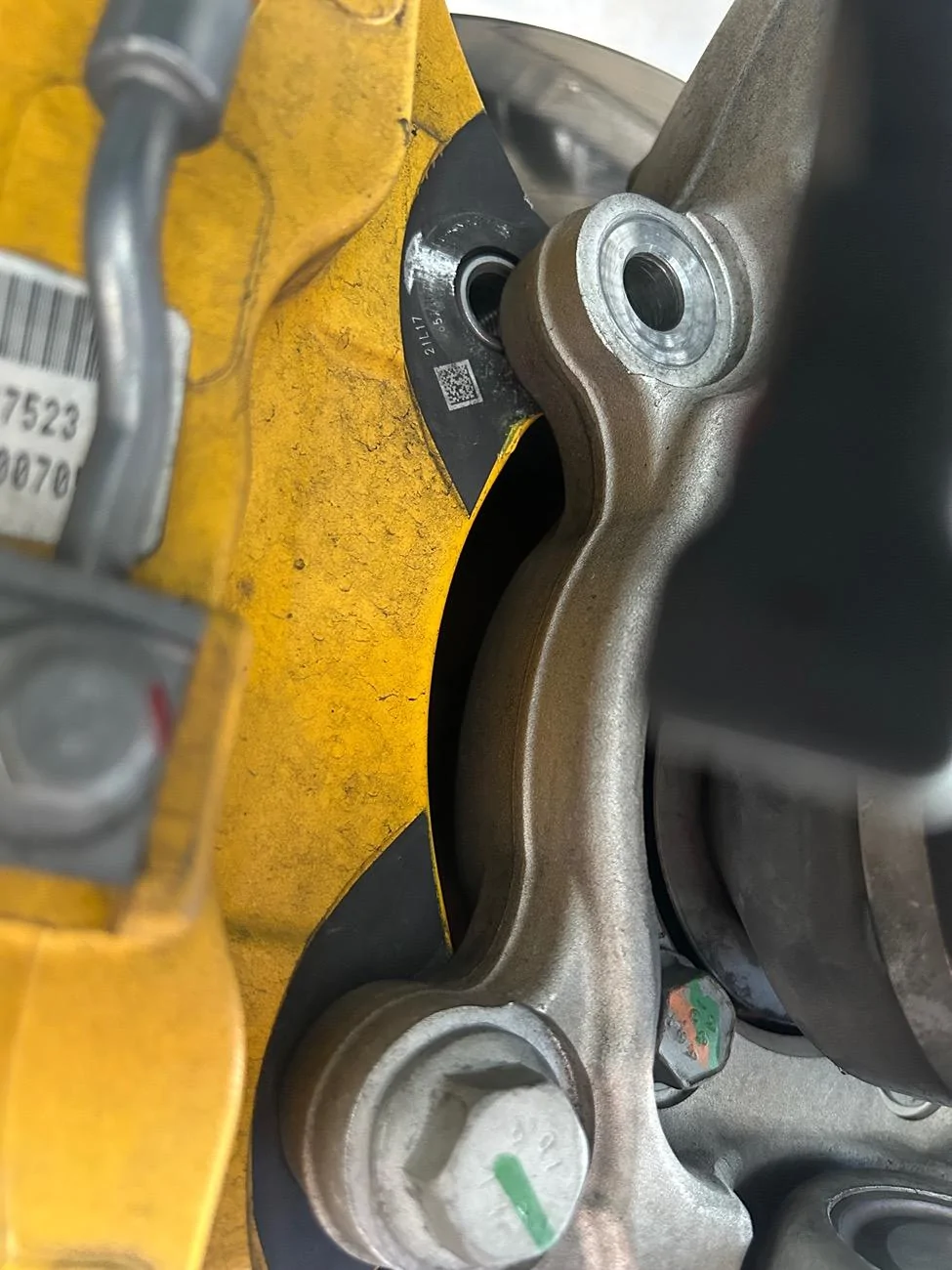Rivian R1T R1S MUSSING BOLT-Bolt Spec needed-Front brake caliper IMG_6208