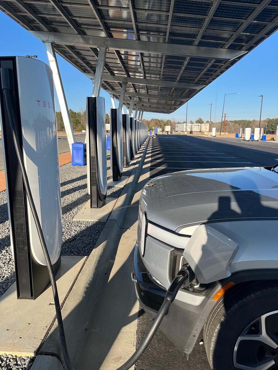 Rivian R1T R1S Tesla V4 charger, love the long cord and lots of stalls! IMG_4975
