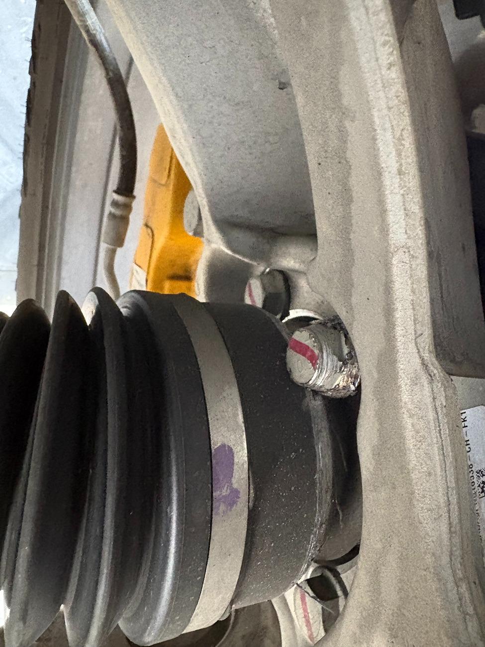 Rivian R1T R1S Update to knock/grind/bonk noise from driveline IMG_4078