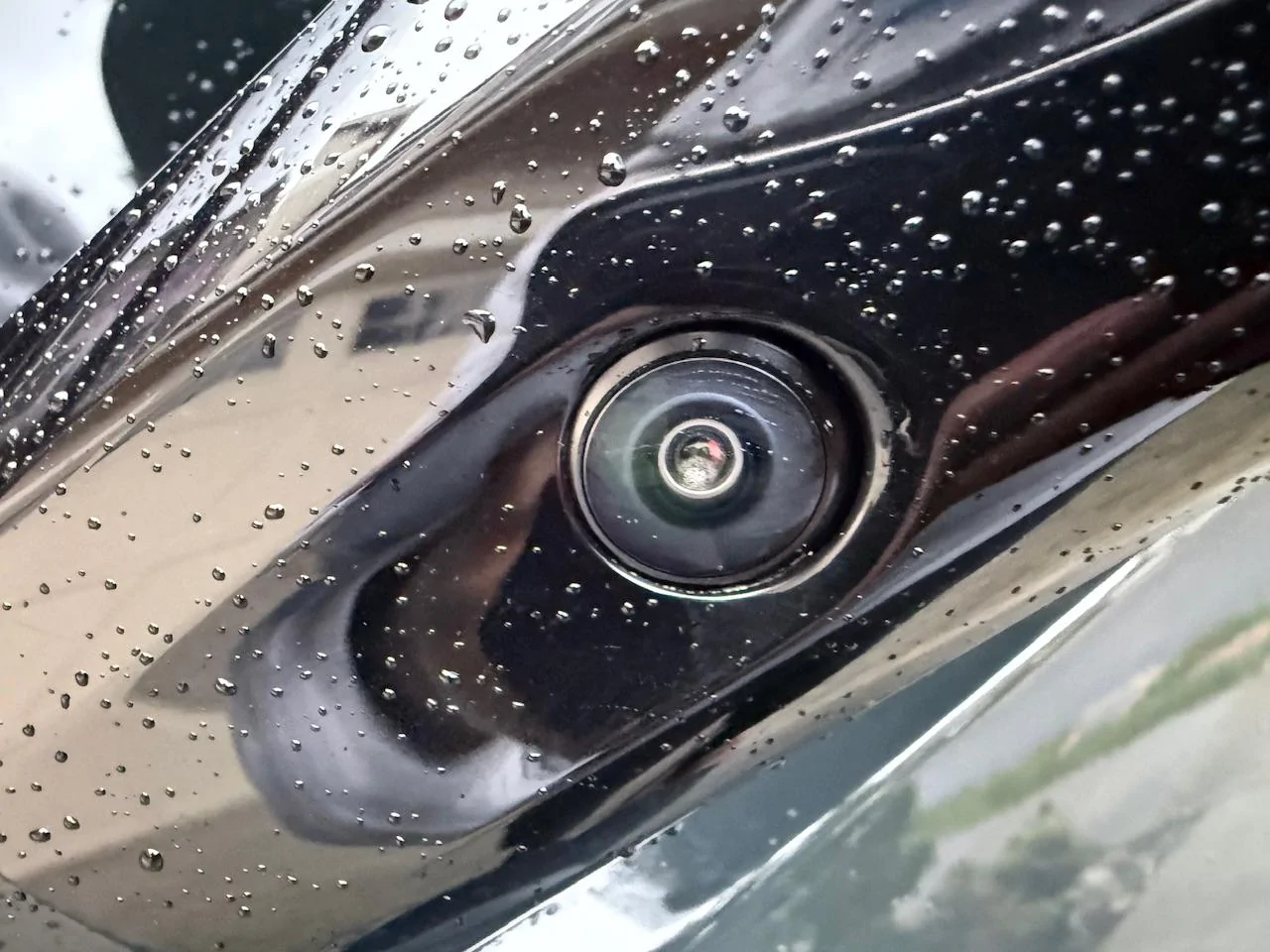 Rivian R1T R1S Anyone have water in their front camera? IMG_3655