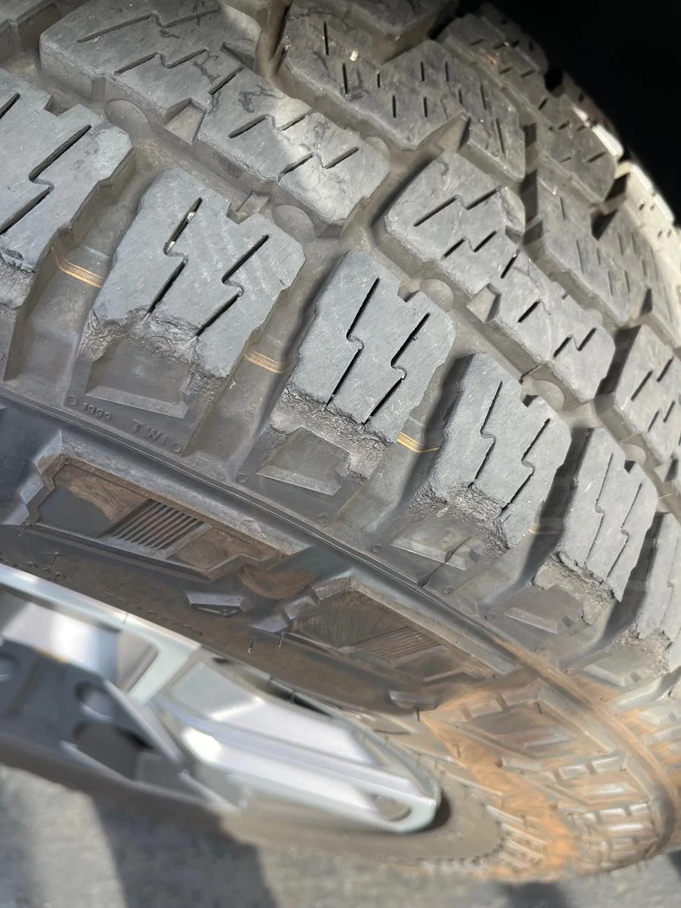 Rivian R1T R1S Outside AT tires exhibiting tread blocks chunking off 9CDF0C24-792C-4CA5-B166-925A8EA331E6