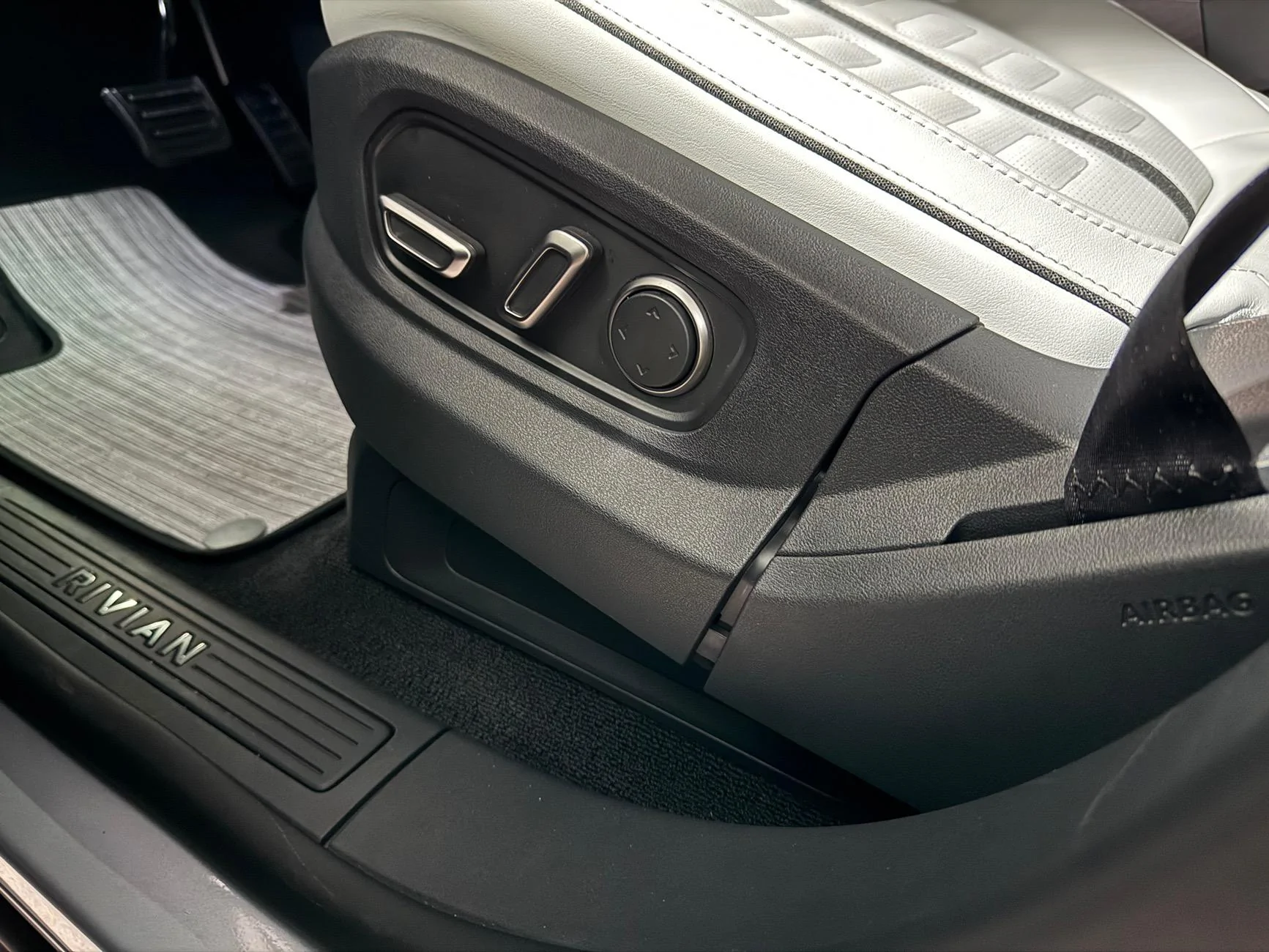 Rivian R1T R1S Gap in the driver seat side panel? IMG_8378
