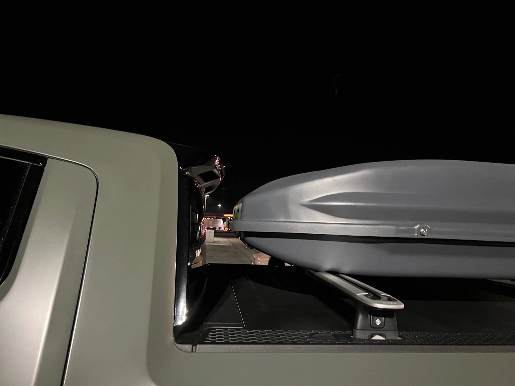 Rivian R1T R1S Cargo box that fits the bed length: Thule Sidekick 32200