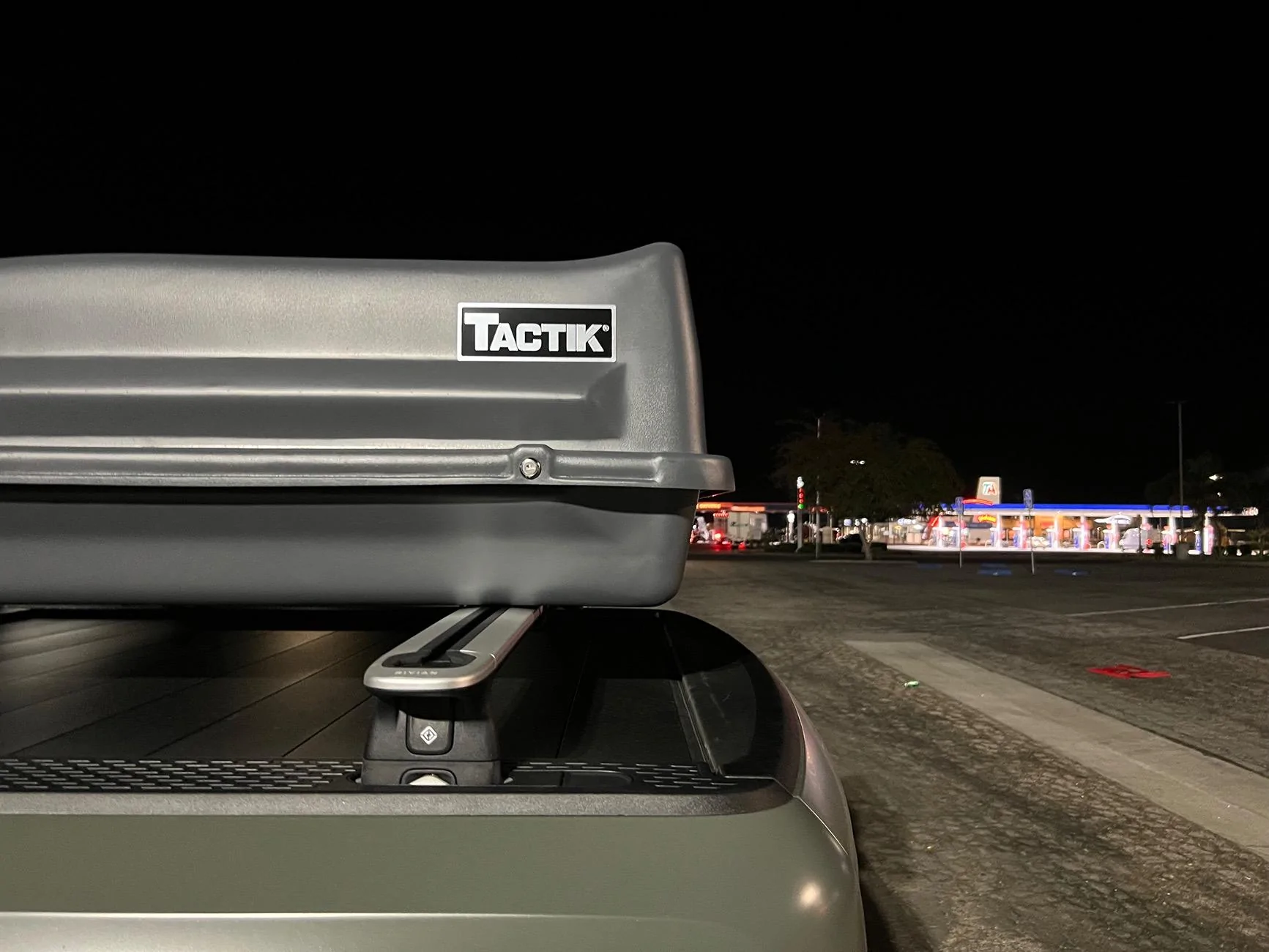 Rivian R1T R1S Cargo box that fits the bed length: Thule Sidekick 32201