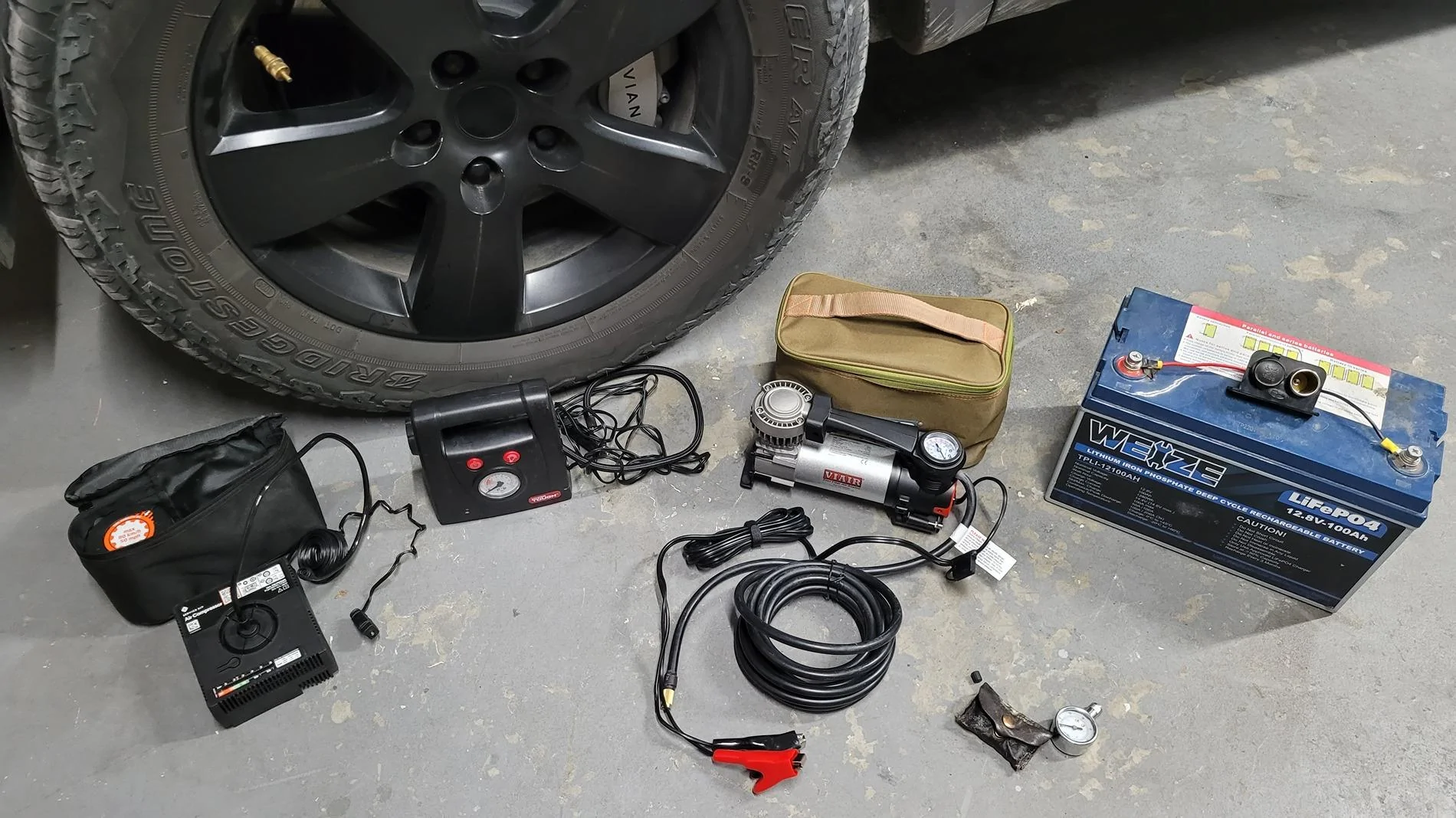 Rivian R1T R1S Testing three compressors for airing up tires. 20250201_121142