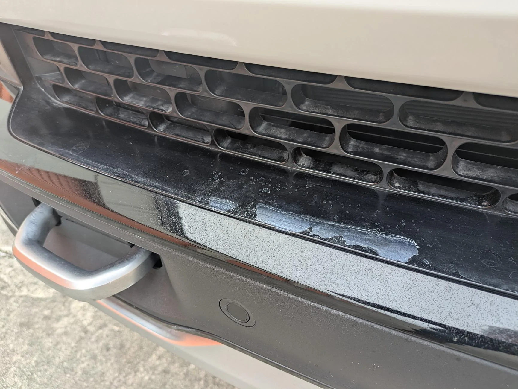 Rivian R1T R1S White Scale/Discoloration on Front Bumper PXL_20250209_195120107