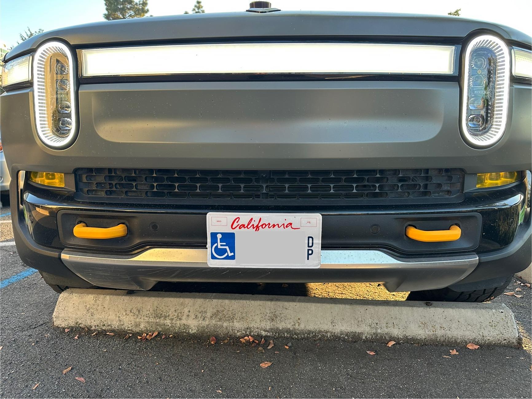 Rivian R1T R1S What screws are used for the front license plate bracket? IMG_4168