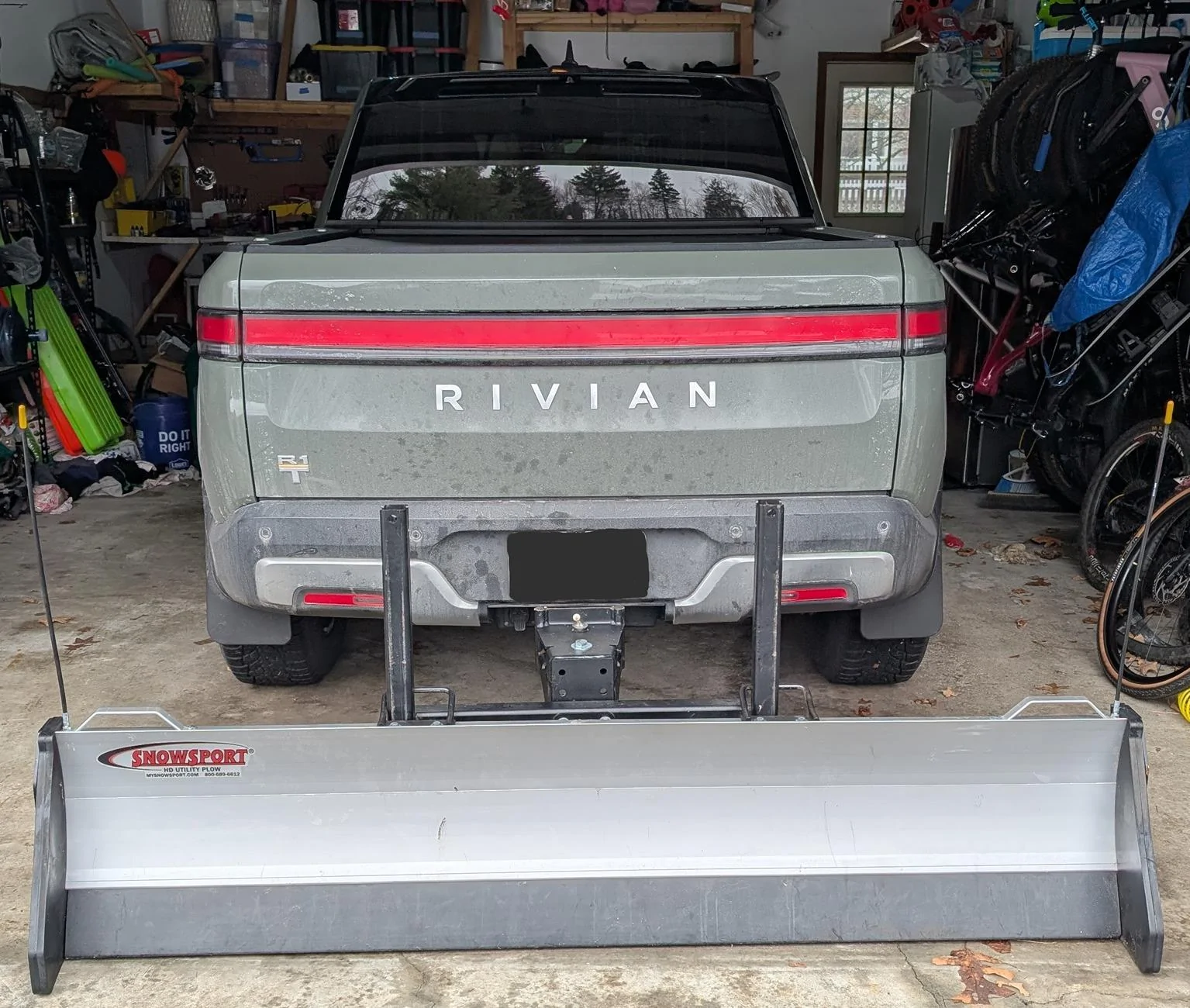 Rivian R1T R1S Snowsport HD Snow Plow mounted on rear hitch of R1T rivian-snowsport-hd