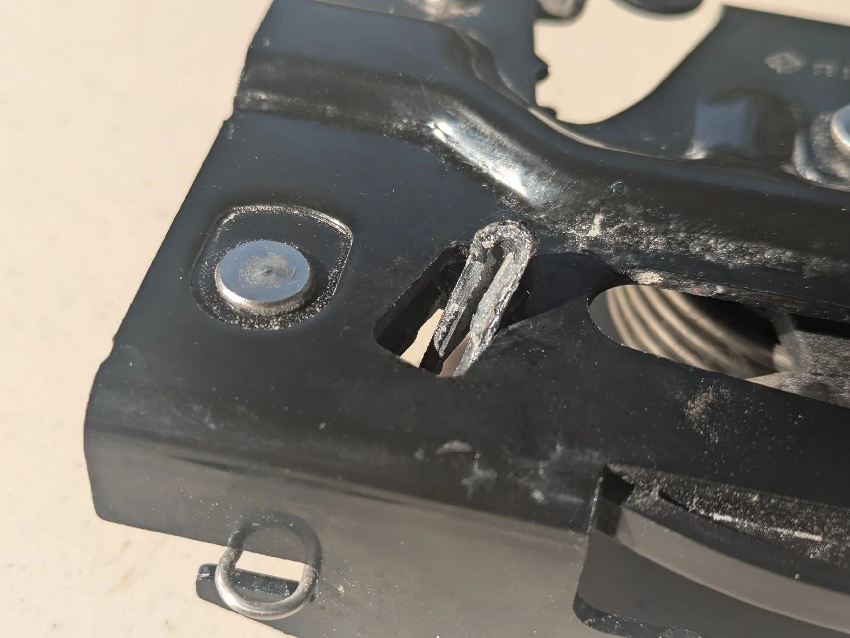 Rivian R1T R1S Broken latch spare tire well - help PXL_20241126_163651477