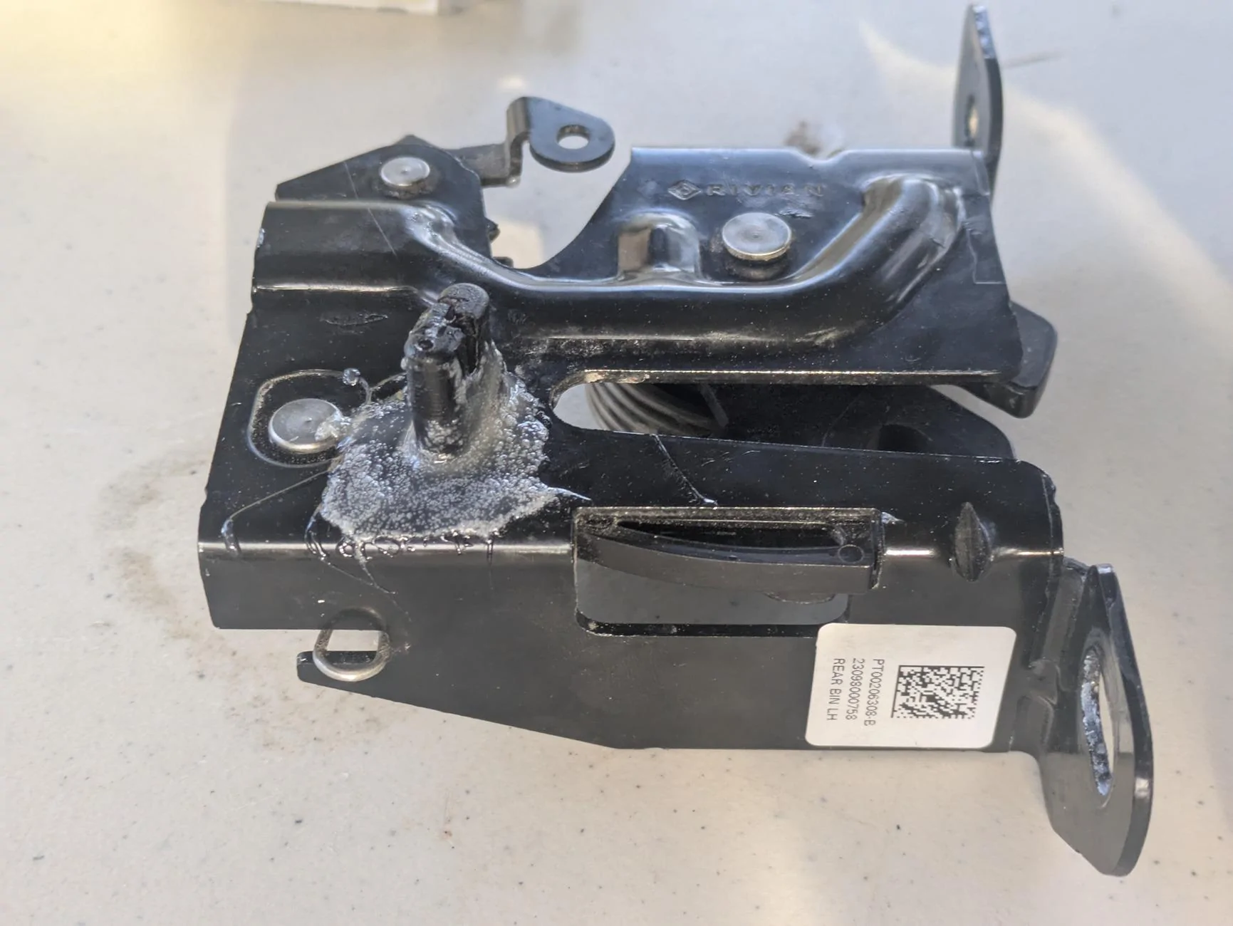 Rivian R1T R1S Broken latch spare tire well - help PXL_20241128_144145147