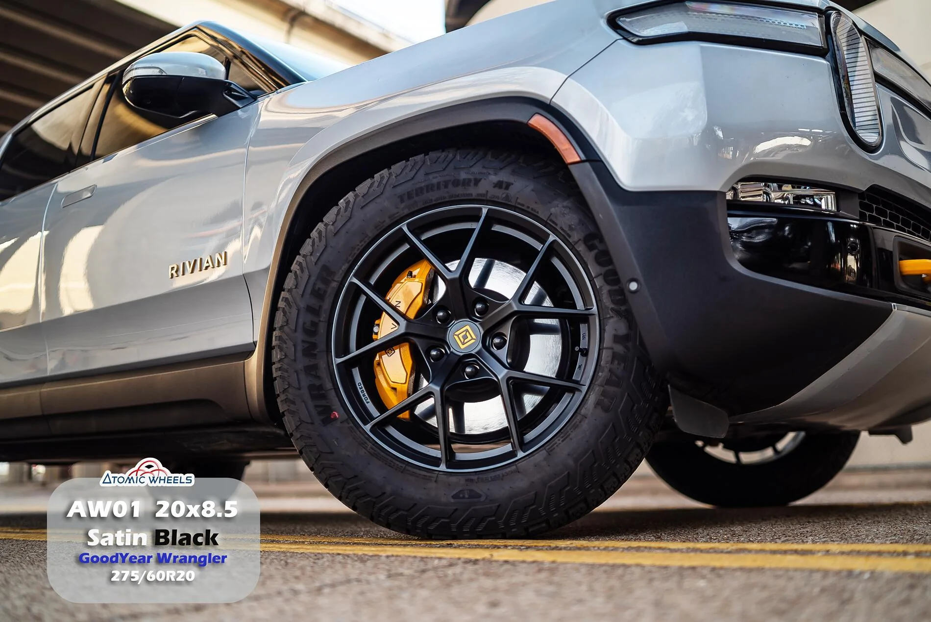 AW0120_Rivian_SatinBlack_Stamp_Site.webp