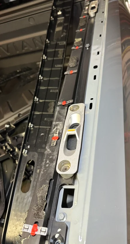 Rivian R1T R1S Pickup bed top trim removal 1741184343256-cg
