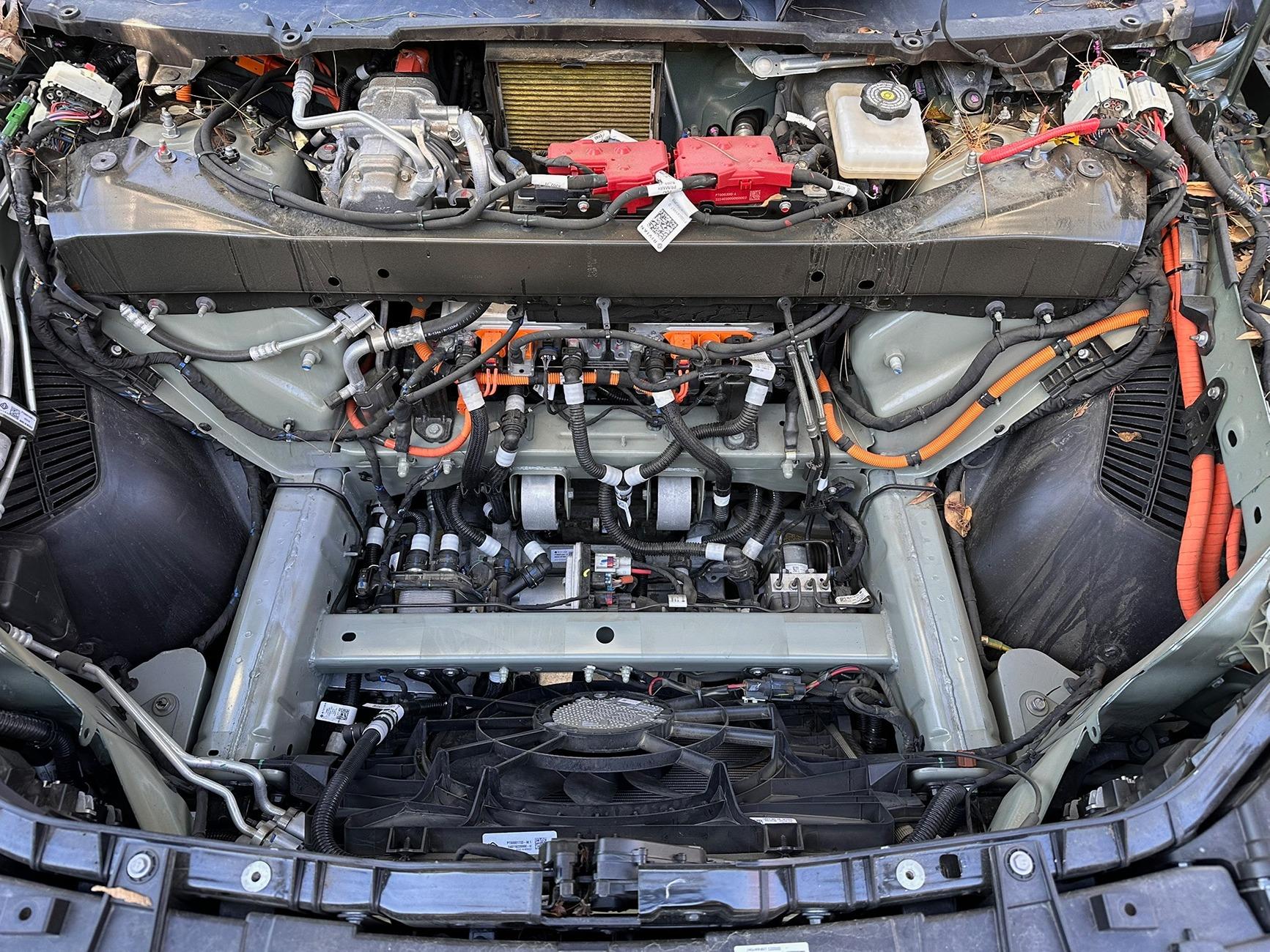 Rivian R1T R1S Installed frunk wired solar-capable 12v battery tender to reduce vampire drain IMG_4085
