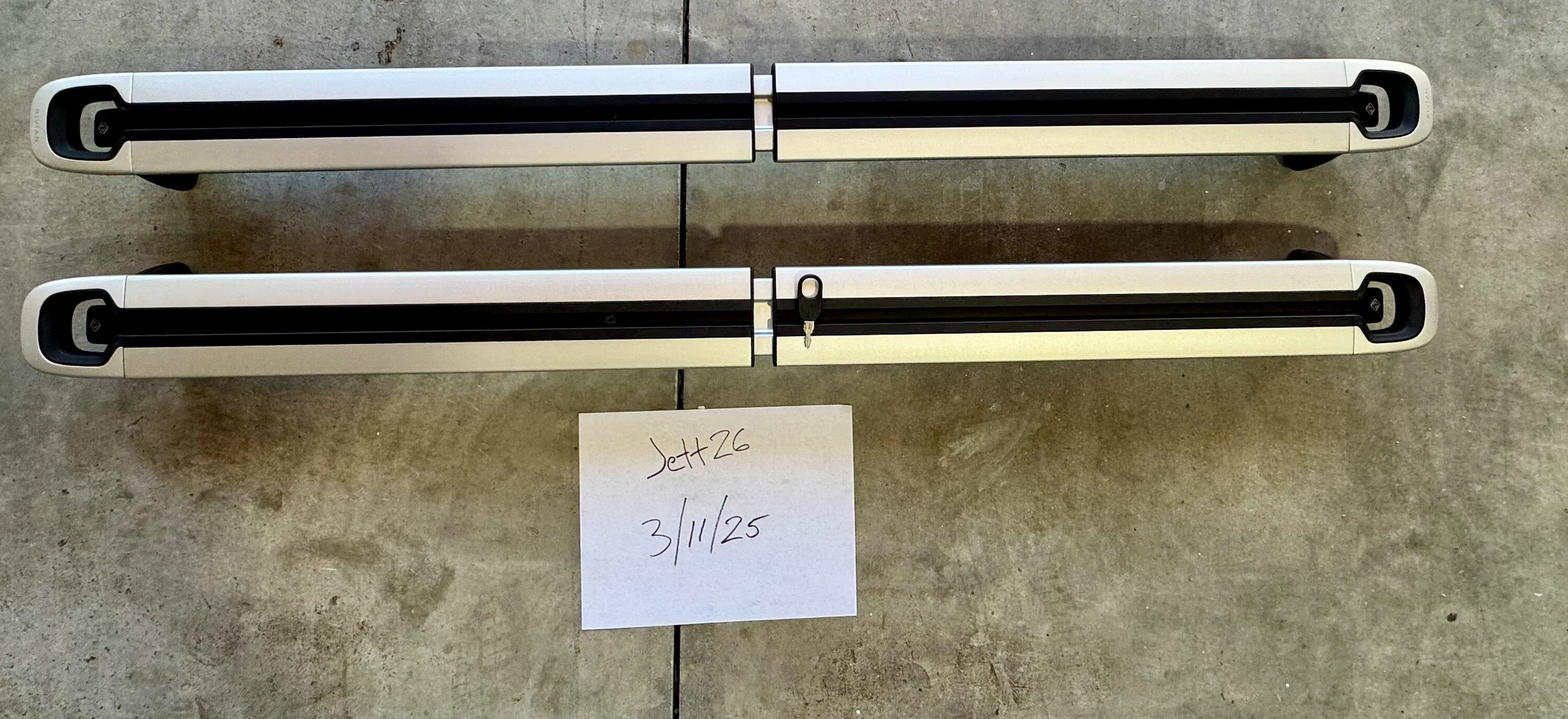 Rivian R1T R1S SOLD- OEM Silver Rivian Cross Bars IMG_8151