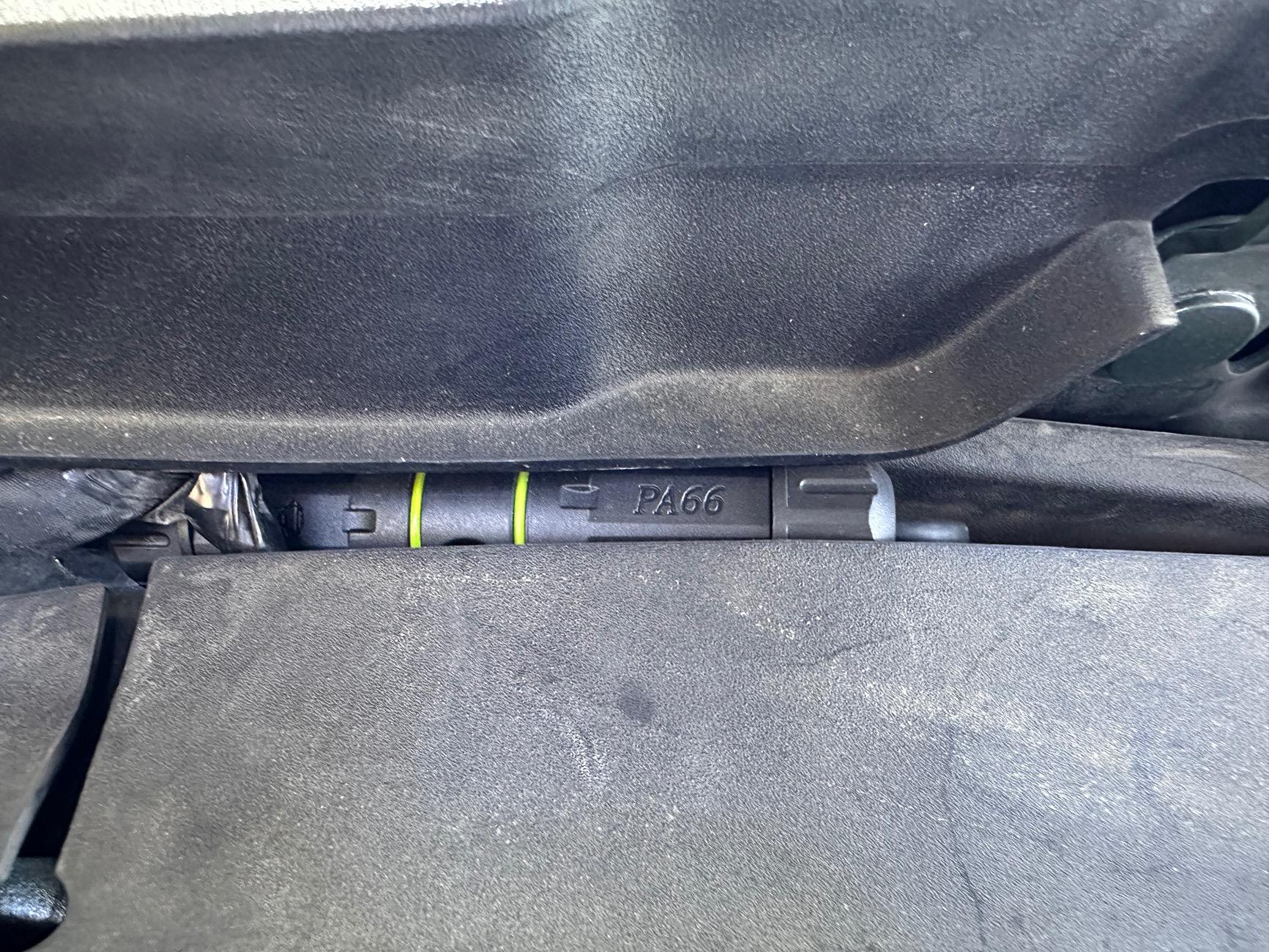 Rivian R1T R1S Installed frunk wired solar-capable 12v battery tender to reduce vampire drain IMG_4294