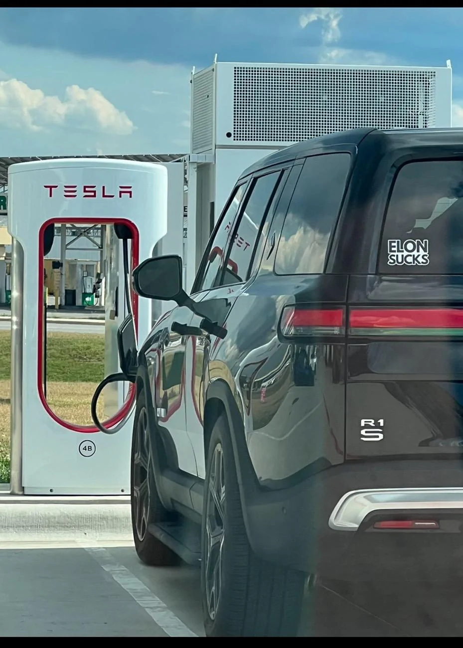 Rivian R1T R1S Alright.  Which one of you was it IMG_2969