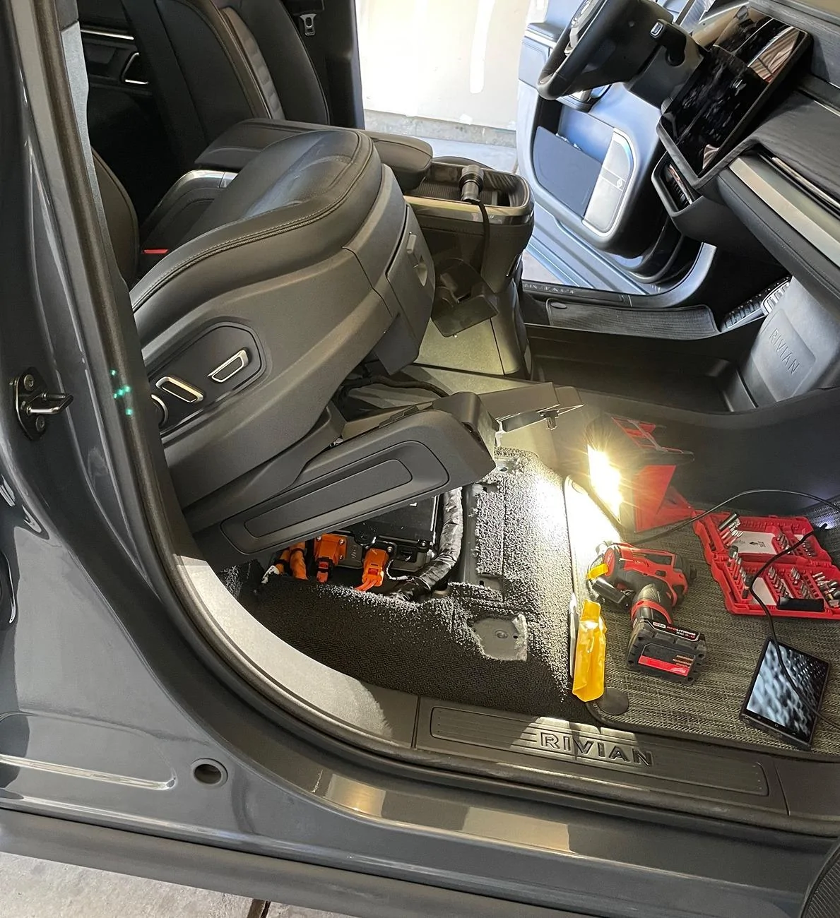 Rivian R1T R1S Help! Diamond ring disappeared between drivers seat and center console! IMG_4637
