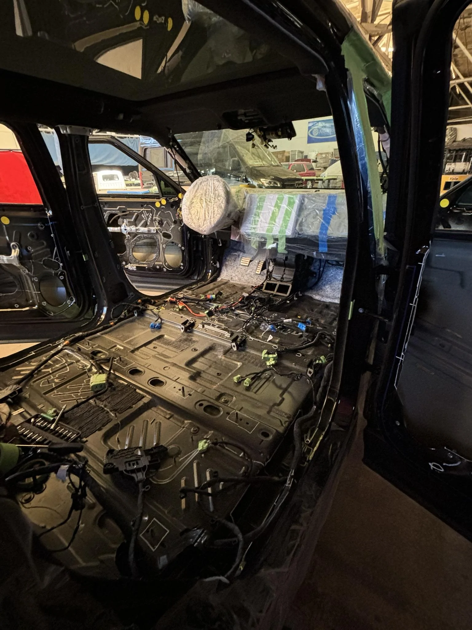 Rivian R1T R1S Did someone say Armor? Real Ballistic Armored (Bulletproof) R1S Tri Motor in production process... image_0 6