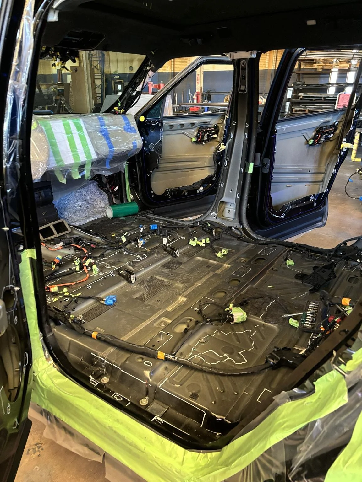 Rivian R1T R1S Did someone say Armor? Real Ballistic Armored (Bulletproof) R1S Tri Motor in production process... image_0 4